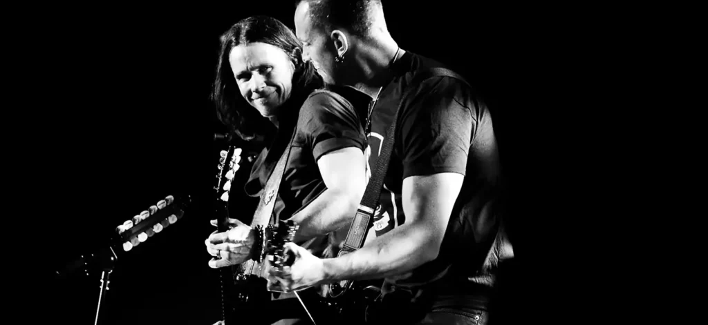 Myles Kennedy and Mark Tremonti on stage performing